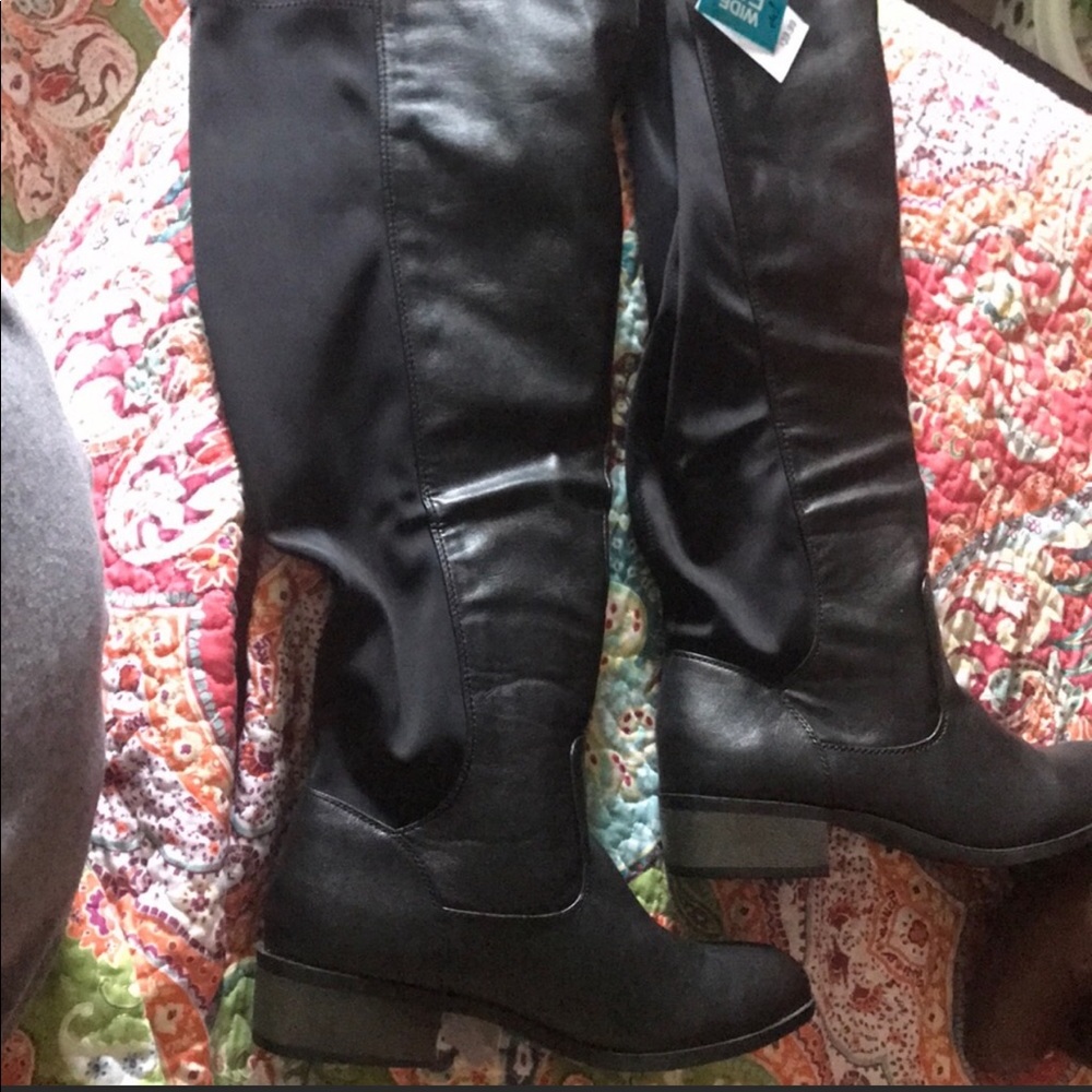 Black knee high riding boot, never worn